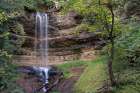USA, Michigan, Hiawatha National Forest. Landscape with Munising Falls and sandstone cliff. Art Print